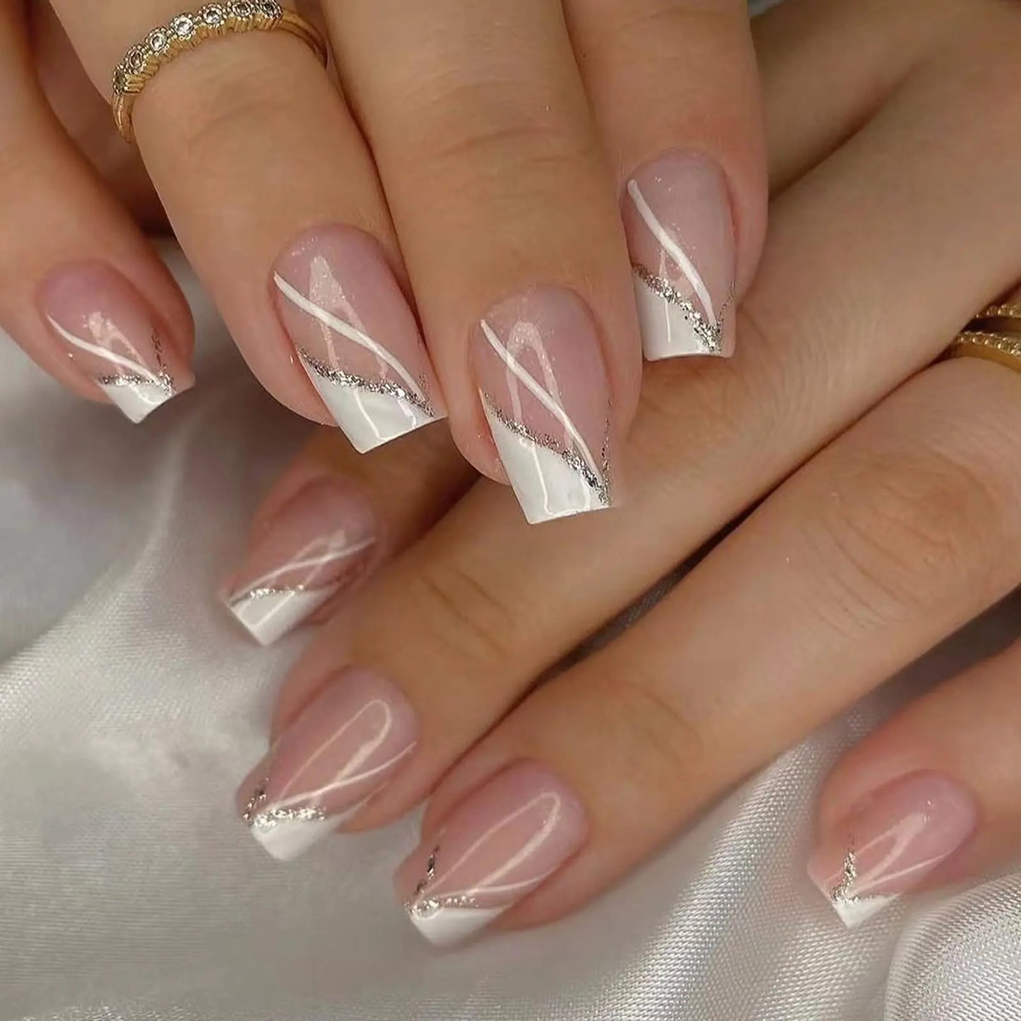 MISUD Press on Nails Medium Coffin Fake Nails Glossy Glue on Nails White Acrylic Nails Ballerina Artificial Nails Bling Glitter Stick on False Nails with Swirl Design 24 pcs