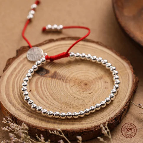 Verdandi Silver Bracelet with Red Cord (Single Piece)